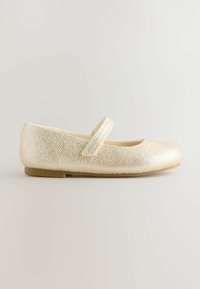 Gold-colored ballet flat with a textured surface, strap across the instep, rounded toe, and a flat sole. Simple design and lightweight material.