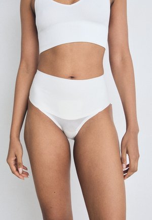 Spanx UNDIETECTABLE TANGA - Shapewear - powder