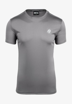 Grijze sportieve t-shirt gemaakt van glad, lichtgewicht materiaal. Heeft korte mouwen, een ronde hals en een klein gorilla-logo op de borst.