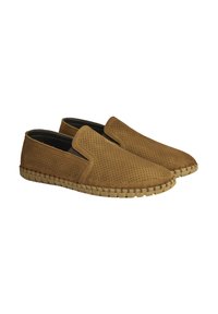 Braune, durchbrochene Slipper mit niedrigem Profil und flexibler, beiger Sohle. Verfügt über eine gewebte Kante für zusätzliche Textur.