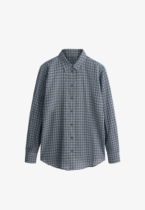Chemise homme à manches longues, boutonnée, à motif à carreaux gris et bleu marine avec col pointu.