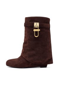 Brown suede ankle boot with a folded design, gold hardware accent, and a flat sole. The texture appears soft and matte.