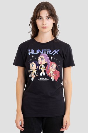 Woman wearing black T-shirt with three colorful cartoon girls in space outfits and text "HUNTRX" and "KPOP DEMON HUNTERS" on front.