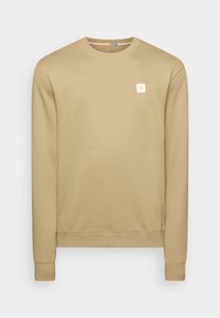 Felpa beige con scollatura a girocollo, polsini e orlo a costine. Presenta un piccolo logo ricamato sul petto. Tessuto morbido e liscio.