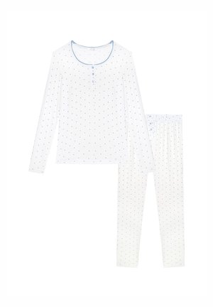 Set di pigiama bianco a maniche lunghe con piccoli pois blu, con la maglia caratterizzata da tre bottoni e bordo blu intorno allo scollo.