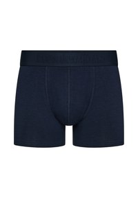 Marineblauwe boxershorts van zacht stof, met een brede elastische tailleband waarop de merknaam is gedrukt. Klassieke pasvorm met een gladde afwerking.