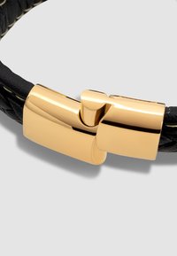 Black braided leather bracelet featuring a polished gold-tone clasp with a sleek design and smooth texture.