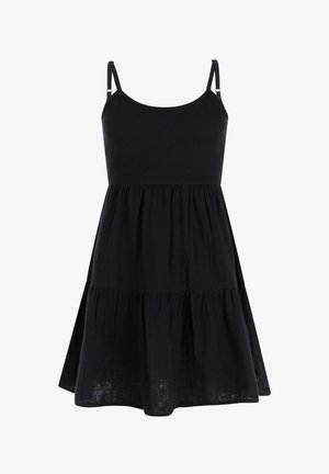 Zwarte mouwloze zomerjurk met verstelbare dunne bandjes en een geplooide, getrapte rok, gemaakt van lichtgewicht stof.