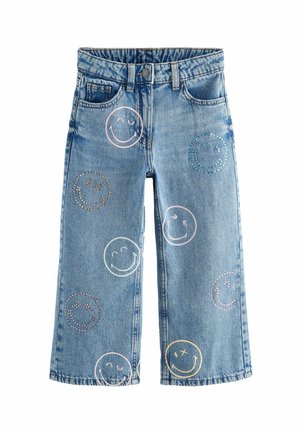 Blaue Denim-Jeans mit weitem Bein und mehreren Smiley-Gesichtsmustern in verschiedenen Farben. Mit Taschen vorne und einem Knopfverschluss.