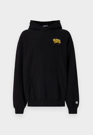 Sweatshirt à capuche noire en coton, doté d'une poche avant et d'un logo graphique jaune sur la poitrine. Poignets et ourlet côtelés.