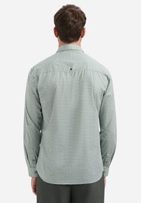 Groen patroon lange mouwen shirt, met een button-down kraag, gestructureerde stof en een klein logo op de achterkant van de hals.