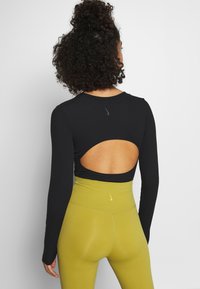 Nike Performance Justaucorps - black