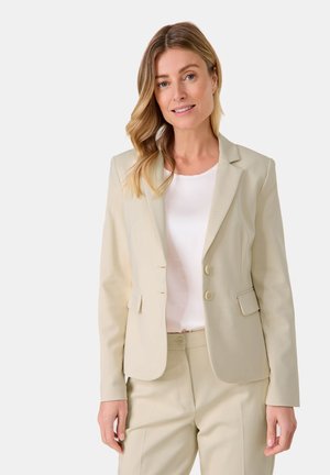 Beige blazer with a tailored fit, single-breasted design, and two front buttons. Features notched lapels and two side pockets.