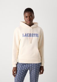 Lacoste Kapuutsiga pusa - lapland