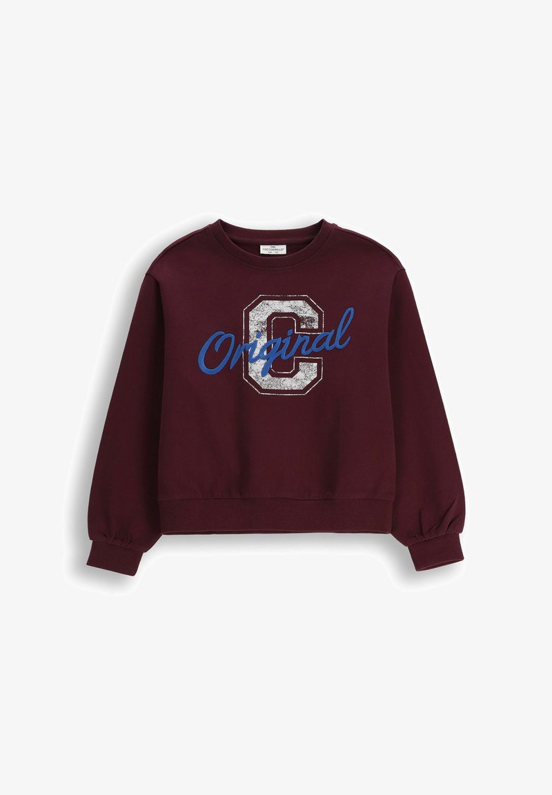 Bordowy krótki sweatshirt z okrągłym dekoltem, z teksturowanym srebnym obrzeżem litery "C" oraz niebieskim tekstem pisanym kursywą "Original."