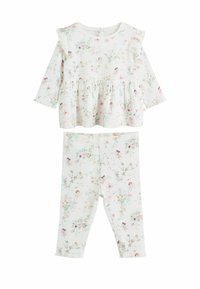 Conjunto de dos piezas con estampado floral que incluye un top de manga larga con detalles de volantes y leggings a juego, ambos en tela blanca suave.