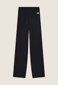 Freddy WENEA - Pantalones deportivos - black