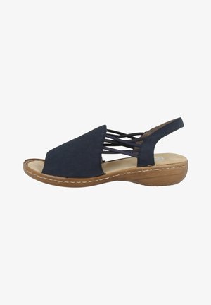 Sandalo slingback blu navy con punta aperta, materiale in suede, design con cinturino incrociato e una suola antiscivolo marrone chiaro. Presenta dettagli cuciti.