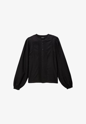 Blouse noire en coton, dotée de manches ballons longues, d'un col rond, d'une fermeture à boutons sur le devant et de plis décoratifs le long de la patte de boutonnage.