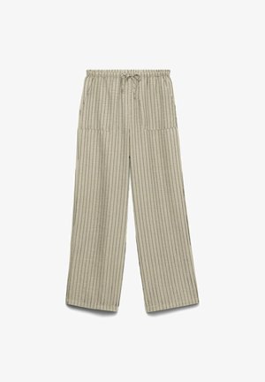Pantalon beige à jambes larges avec fines rayures verticales noires, taille élastique avec cordon de serrage, et deux poches plaquées à l'avant.