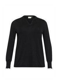 Haut noir à manches longues en tissu doux, avec un décolleté en V et des poignets froncés, offrant une coupe décontractée et des détails de couture discrets.