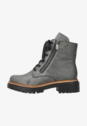 Gray leather ankle boots with a rounded toe, black lace-up front, side zipper, and rugged rubber sole. Stitched detail around the sole.