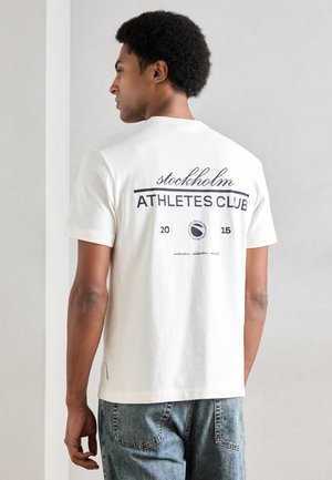 RELAXED FIT - Nyomott mintás póló - white