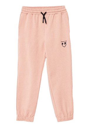 Pantaloni della tuta rosa chiaro realizzati in un tessuto morbido, con cintura elastica e cordoncino nero, e polsini alle caviglie. Piccolo logo laterale.