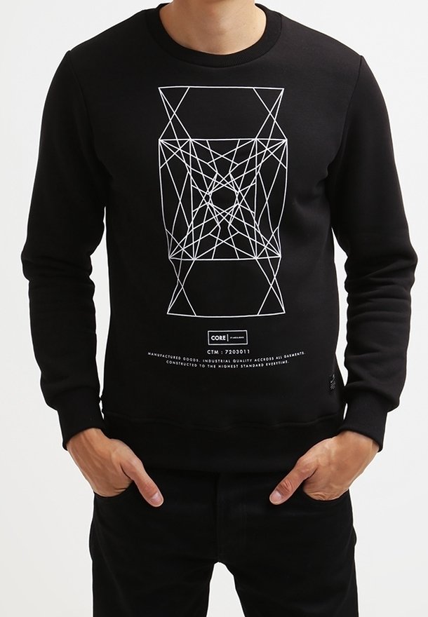 Sweat-shirt noir en matériau doux, avec un design graphique blanc géométrique à l'avant et des poignets et un col côtelés.