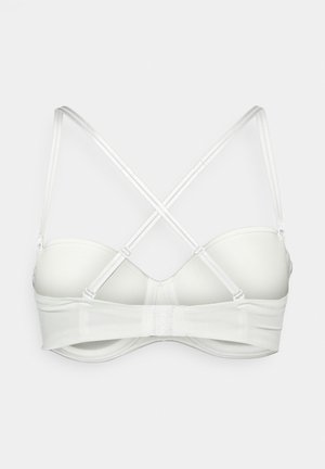 Balta paminkštinta liemenėlė su lankeliais ir reguliuojamomis kriauštės formos petnešėlėmis, rodoma iš nugaros su kabliukų užsegimo juosta.