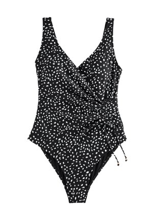 Fekete egyrészes fürdőruha fehér pöttyös mintával, átkötős dizájnnal, állítható oldalsó megkötőkkel és széles vállpántokkal.