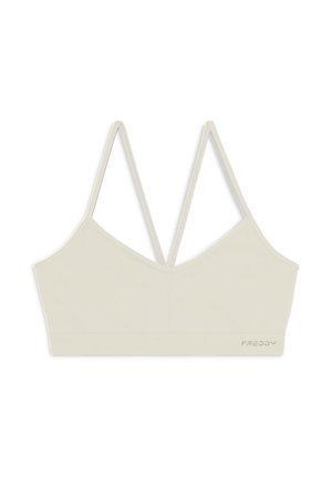 SEAMLESS CON SPALLINE INCROCIATE - Reggiseno sportivo con sostegno leggero - white
