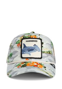 Cappello con motivo mimetico floreale grigio, dotato di un patch ricamato con uno squalo martello e il testo "HAMMERED." Decorato con fiori arancioni.