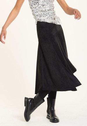 ASYMMETRIC MIDI - A-line skirt - black