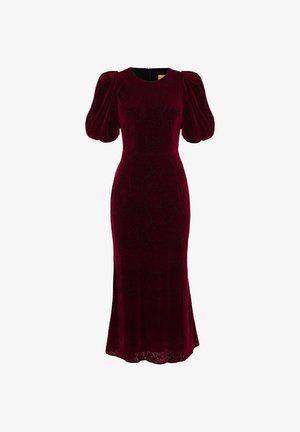 Burgundowa sukienka z aksamitu o kwiatowej fakturze, dopasowanym gorsecie i bufianych rękawach. O długości do połowy łydki z lekkim rozszerzeniem u dołu, z tylnym zamkiem.