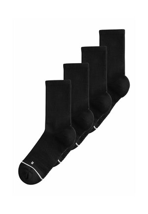 Vijf paar zwarte sneakersokken met geribbelde boordjes en witte stiksels bij de tenen, diagonaal gerangschikt op een witte achtergrond.