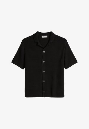 Black short-sleeve knit shirt with open collar and five buttons down the front, featuring a textured pattern.