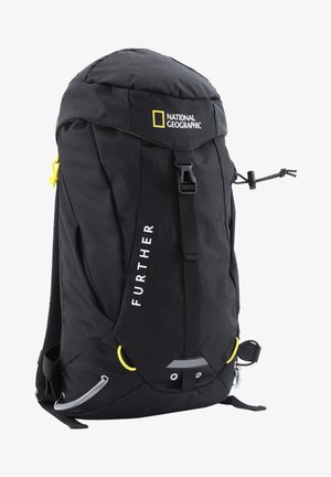Black backpack featuring a textured surface, adjustable straps, yellow accents, and "NATIONAL GEOGRAPHIC" and "FURTHER" branding.