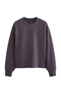 Felpa viola con collo rotondo, polsini a coste e dettagli testurizzati sui lati. Realizzata in tessuto morbido, presenta una vestibilità rilassata.