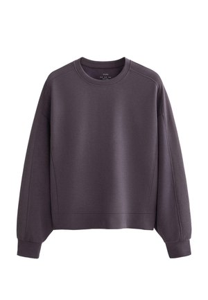 Felpa viola con collo rotondo, polsini a coste e dettagli testurizzati sui lati. Realizzata in tessuto morbido, presenta una vestibilità rilassata.