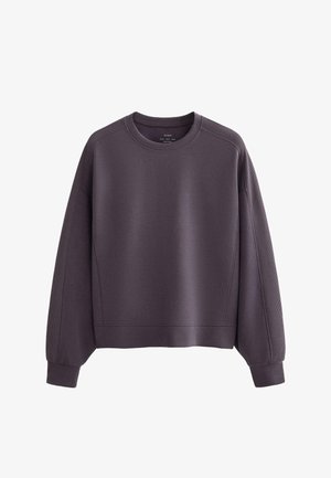 Felpa viola con collo rotondo, polsini a coste e dettagli testurizzati sui lati. Realizzata in tessuto morbido, presenta una vestibilità rilassata.