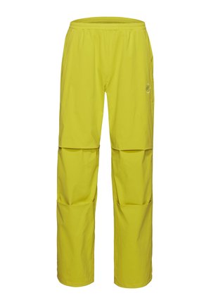 Pantaloni convertibili giallo brillante con gambe staccabili con zip, vita elastica e tasche laterali, progettati per attività all'aperto.