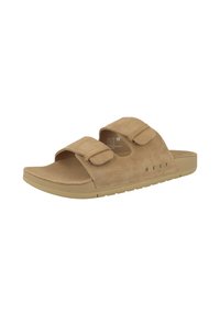 Sandali in suede beige con due cinturini regolabili in Velcro, suole piatte e un discreto logo sul lato. Texture morbida, design informale.