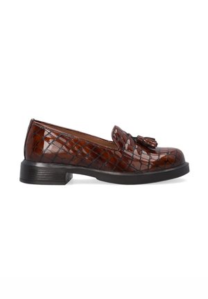 Brown leather loafers with a crocodile embossed pattern, featuring a decorative tassel, and a low black heel.