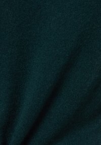 Gebreide stof in een diepe teal kleur met een zachte, gestructureerde oppervlakte; heeft subtiele variaties in textuur en een strak weefsel.