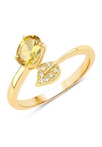 Bague en or ornée d'une pierre précieuse jaune ovale avec un design de feuille serti de petites pierres scintillantes, bande lisse, finition polie.