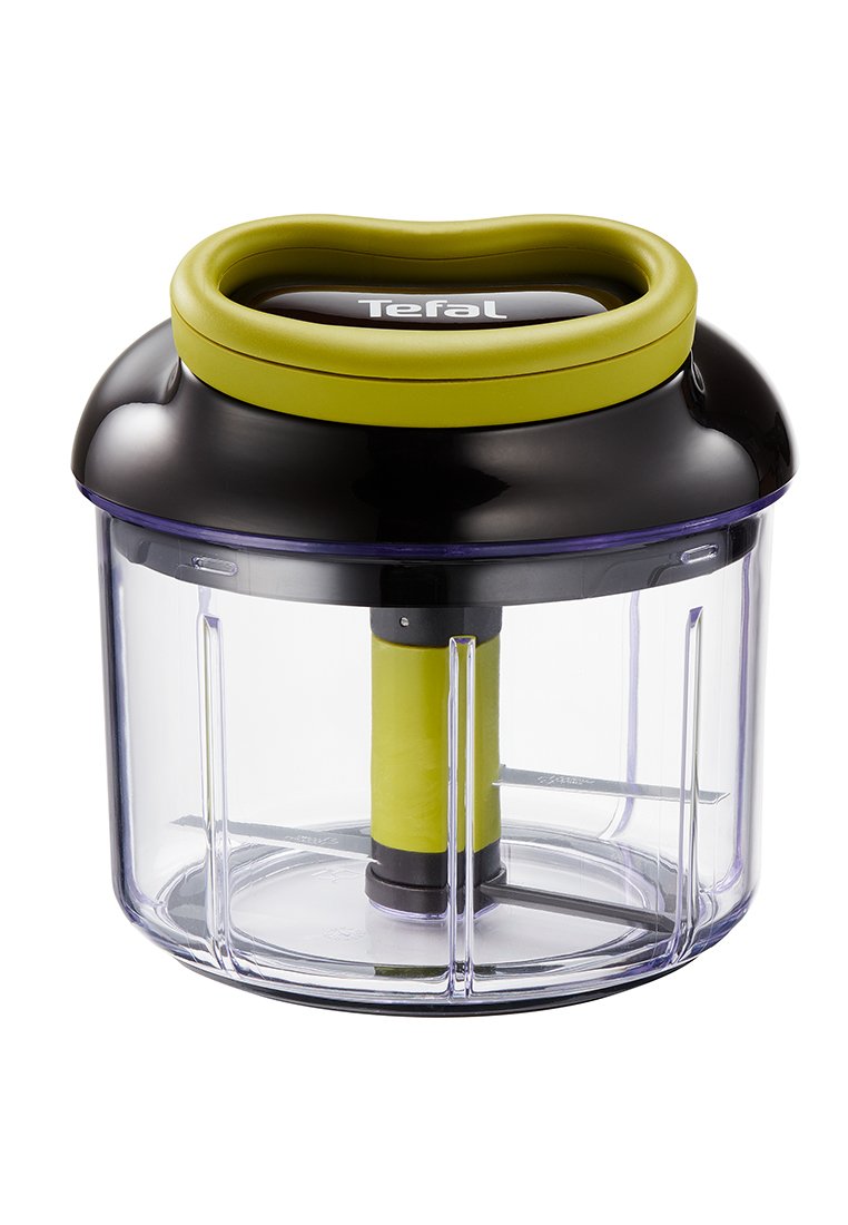 Hachoir à main avec un conteneur transparent, un couvercle noir et vert, et des lames en acier inoxydable à l'intérieur.