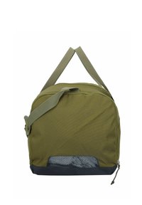 Borsa in tessuto verde oliva con una superficie morbida e strutturata, dotata di spallacci regolabili, un pannello in rete nella parte inferiore e una chiusura con zip.