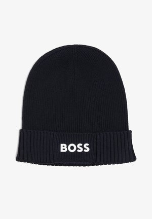 Navy knitted beanie with ribbed texture and a folded cuff featuring the white logo "BOSS" prominently on the front.