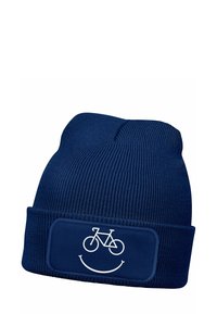 Navy knitted beanie with a cuff; features a white bicycle graphic and a smiley face design on a rectangular patch. Soft texture.